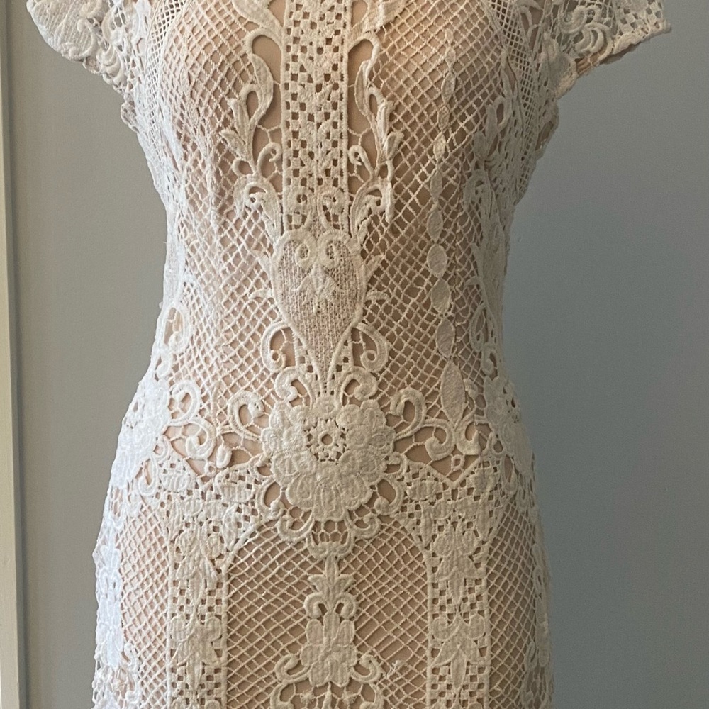 SUPERDOWN lace mini dress with low cut back and capped sleeves.